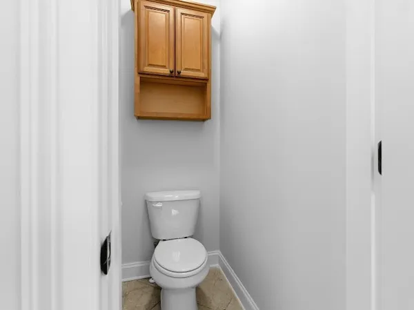 a kitchen with a table and chairs