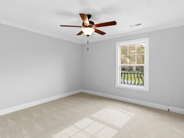 a view of a backyard with sitting area