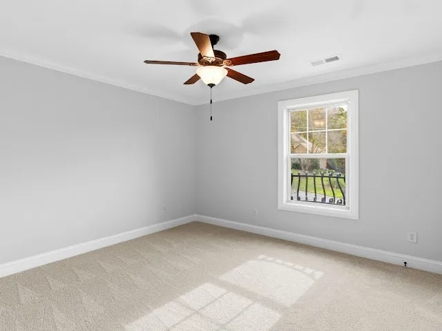 a view of a backyard with sitting area