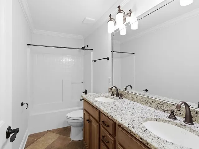 a backyard of a house with plants and large trees