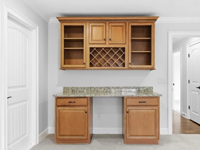 a view of a swimming pool with outdoor seating