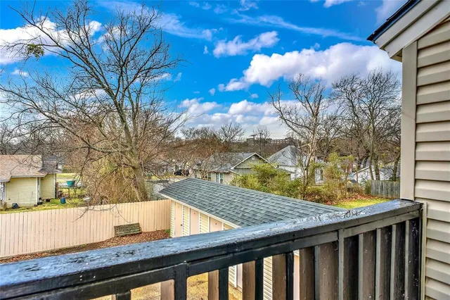 a view of swimming pool from a balcony