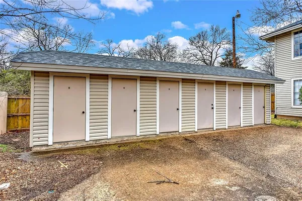 a view of a house with a street