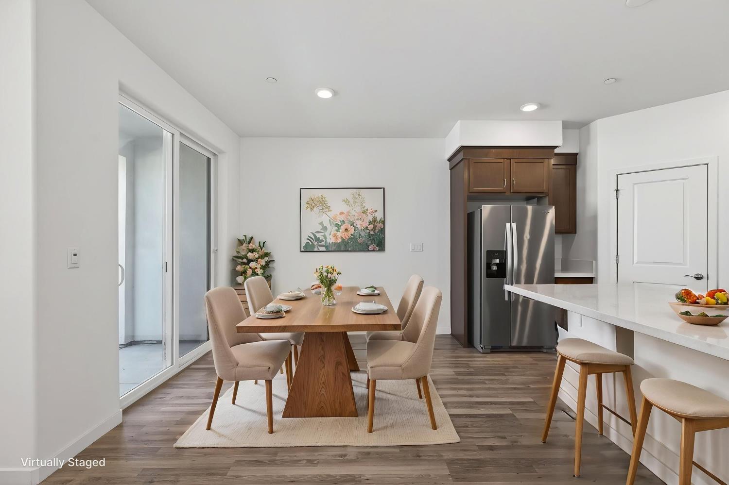 3080 Windwalker Walk Sacramento, CA 95833 - Photo 18 of 61 a dining room with furniture and wooden floor