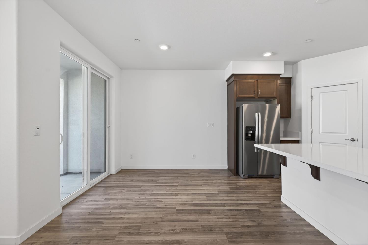 3080 Windwalker Walk Sacramento, CA 95833 - Photo 19 of 61 a view of a kitchen with a refrigerator and a stove top oven