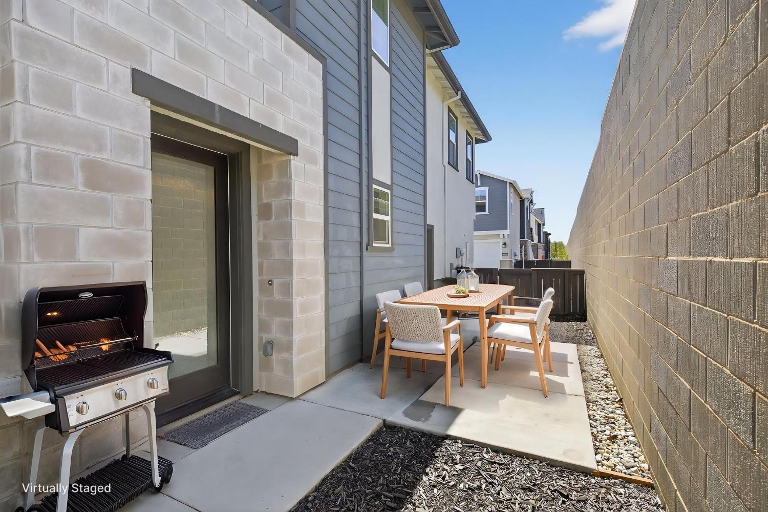 3080 Windwalker Walk Sacramento, CA 95833 - Photo 3 of 61 a backyard of a house with table and chairs