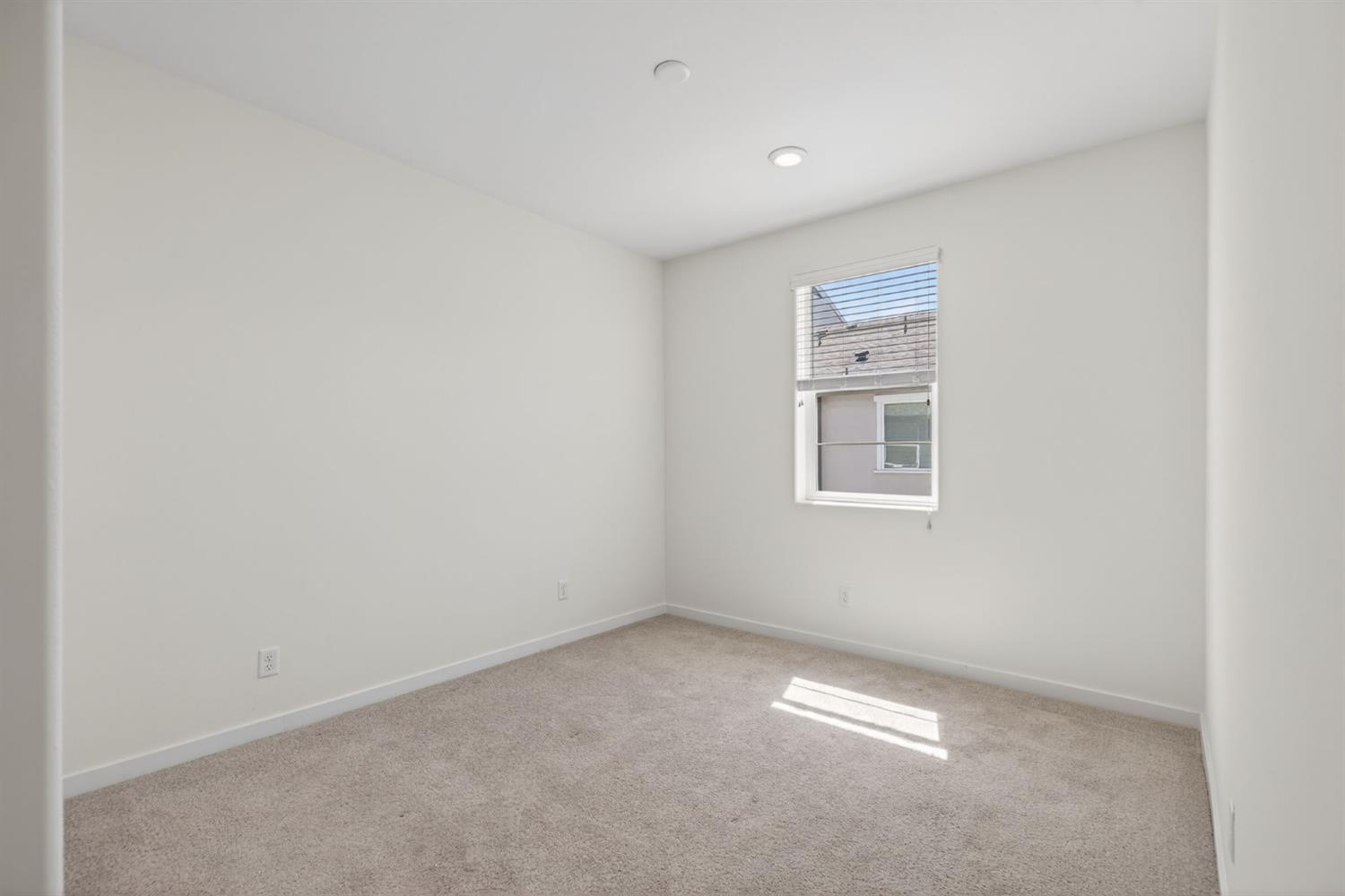 3080 Windwalker Walk Sacramento, CA 95833 - Photo 39 of 61 a view of an empty room with a window