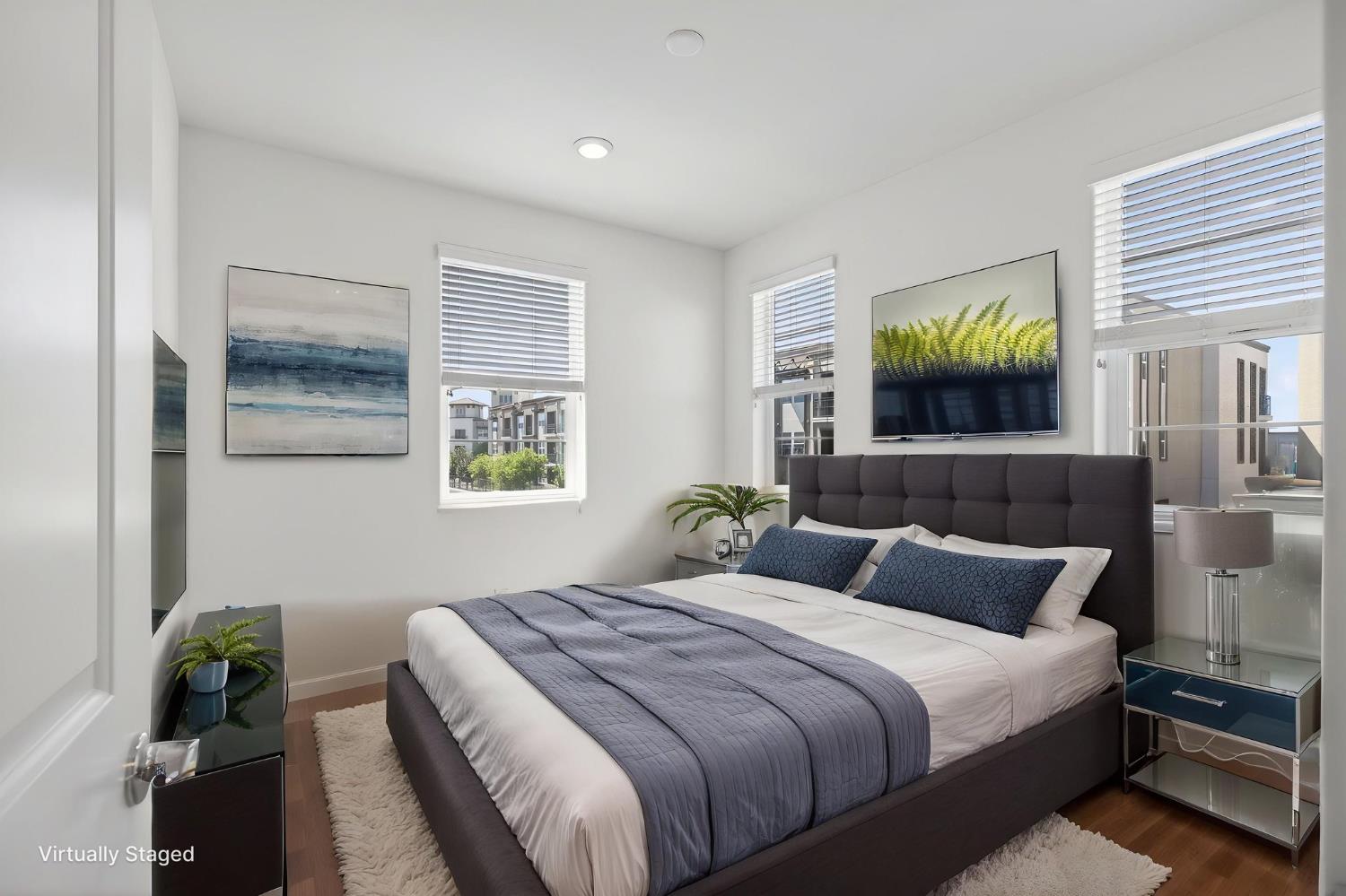 3080 Windwalker Walk Sacramento, CA 95833 - Photo 40 of 61 a bedroom with a bed and a painting on the wall