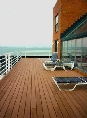 a view of swimming pool with chairs