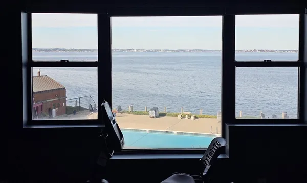 a view of a ocean from a window