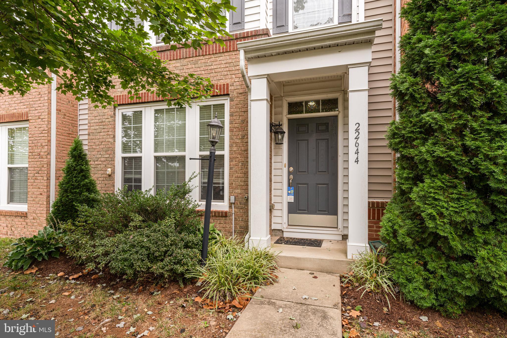 22644 Amberjack Square Brambleton, VA 20148 - Photo 2 of 34 front view of a house with a yard