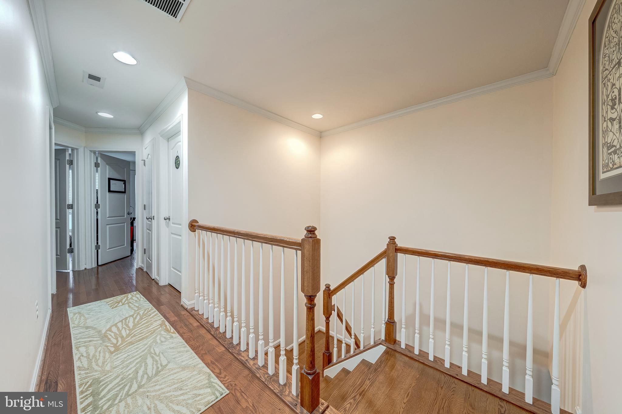 22644 Amberjack Square Brambleton, VA 20148 - Photo 21 of 34 a view of a hallway with a livingroom