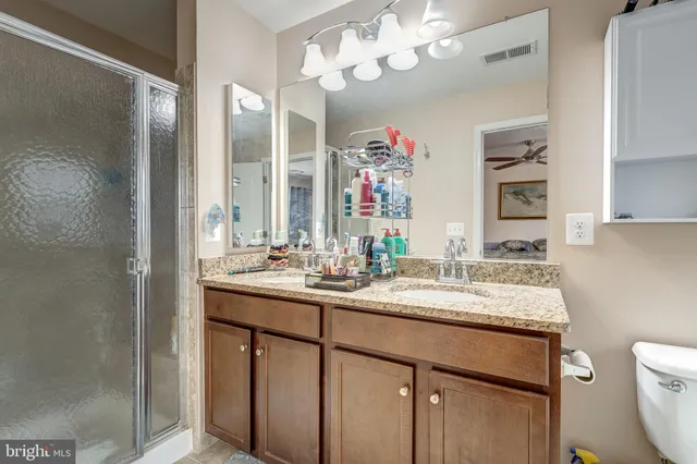 a bath tub sitting in a bathroom next to a window