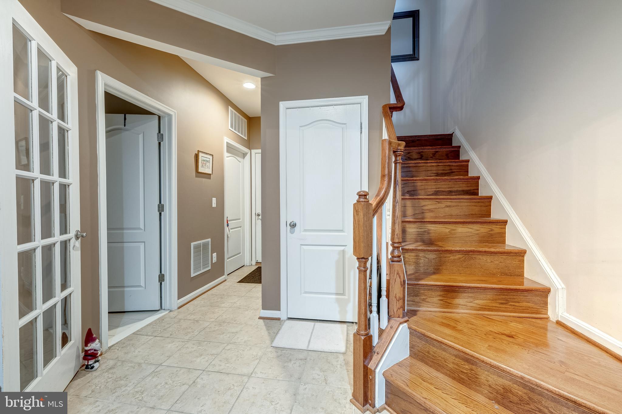 22644 Amberjack Square Brambleton, VA 20148 - Photo 4 of 34 a view of entryway and gallery with wooden floor