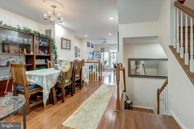 a view of a dining area with furniture window and wooden floor