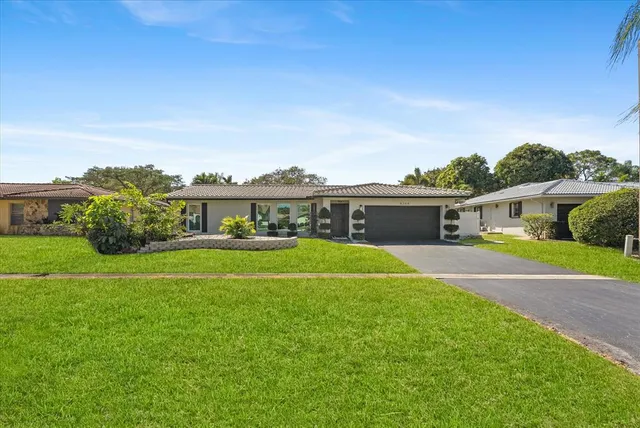 $850,000 | 8264 Shadow Wood Boulevard, Coral Springs, FL 33071