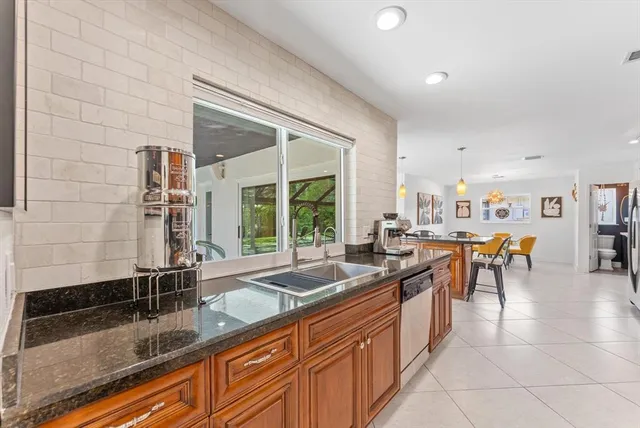 $850,000 | 8264 Shadow Wood Boulevard, Coral Springs, FL 33071