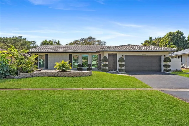 $850,000 | 8264 Shadow Wood Boulevard, Coral Springs, FL 33071