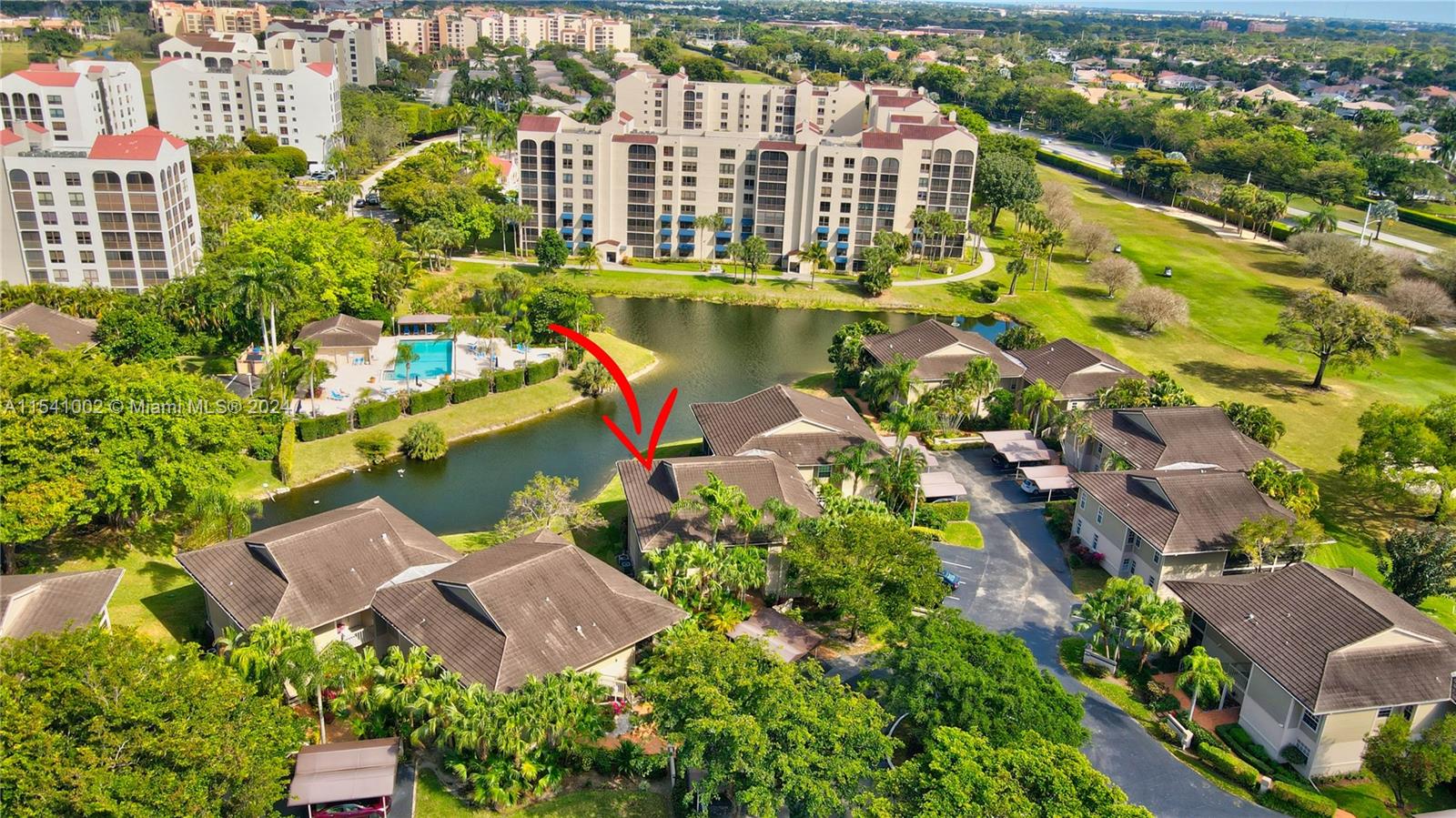 7602 Elm Ridge Drive, Unit 4L Boca Raton, FL 33433 - Photo 35 of 44 an aerial view of residential houses with outdoor space and swimming pool