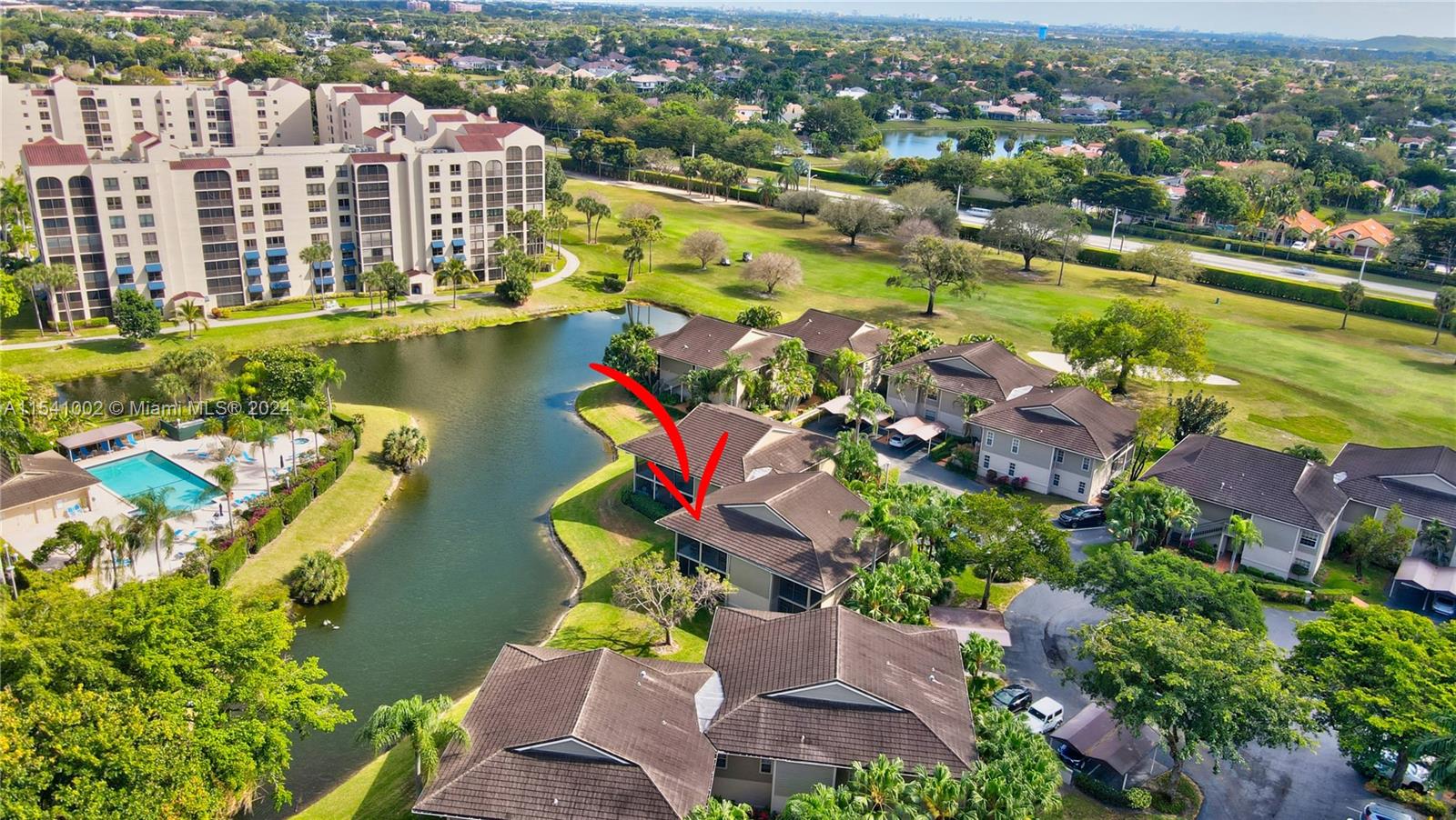 7602 Elm Ridge Drive, Unit 4L Boca Raton, FL 33433 - Photo 36 of 44 an aerial view of residential houses with outdoor space and lake view