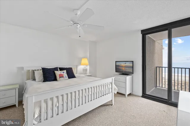 a bedroom with double bed and a window