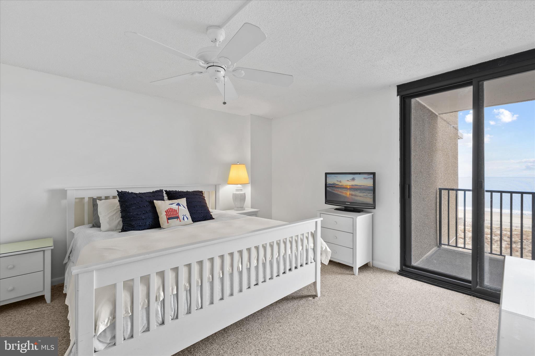 603 North Edgewater House Road, Unit 603N Bethany Beach, DE 19930 - Photo 13 of 40 a bedroom with double bed and a window
