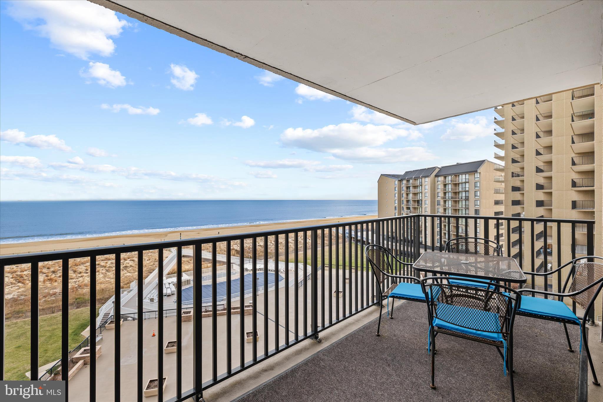 603 North Edgewater House Road, Unit 603N Bethany Beach, DE 19930 - Photo 21 of 40 a balcony with a bench