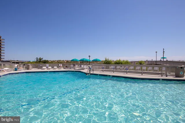 a view of a yard with an ocean