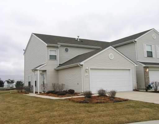 25133 Faraday Road, Unit 1 Manhattan, IL 60442 - Photo 1 of 1 a backyard of house with outdoor seating