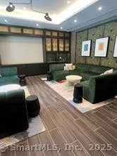 a kitchen with stainless steel appliances granite countertop a sink counter space and cabinets