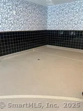 a kitchen with a refrigerator a sink and a stove