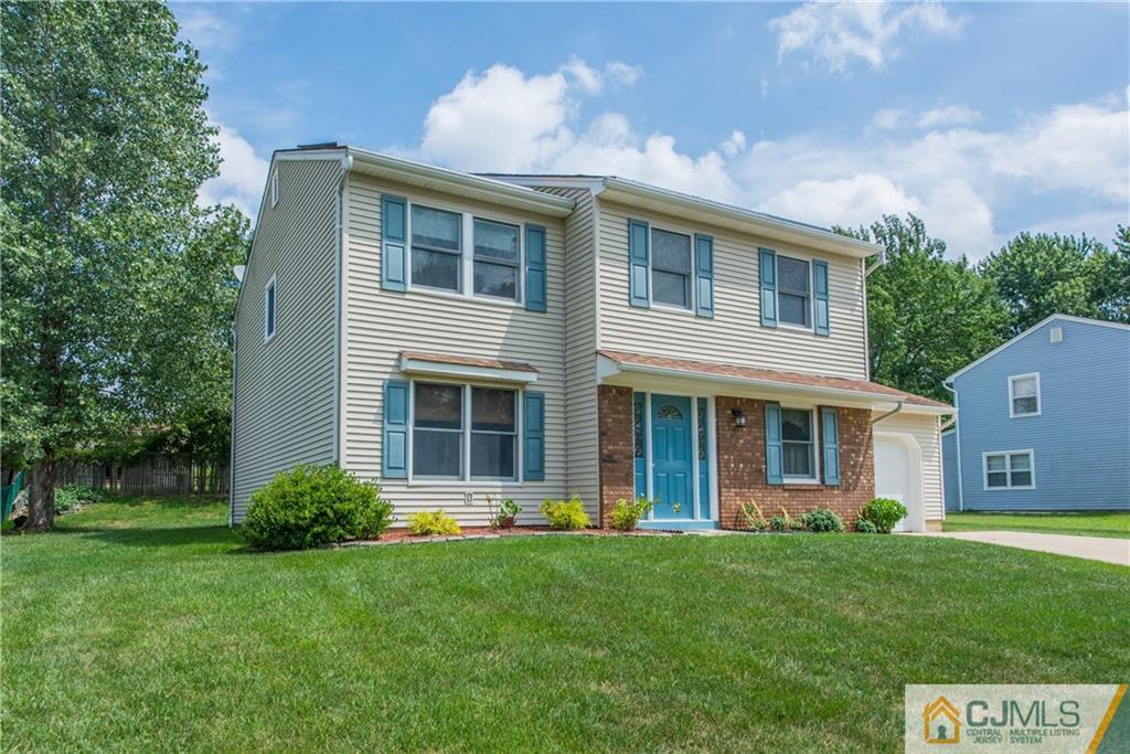 48 Roxy Avenue Edison, NJ 08820 - Photo 2 of 32 a view of a house with a yard
