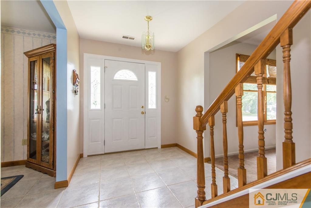 48 Roxy Avenue Edison, NJ 08820 - Photo 3 of 32 a view of an entryway with a front door