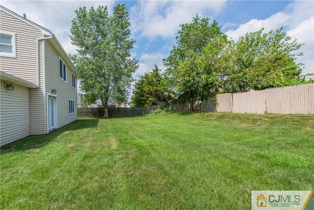48 Roxy Avenue Edison, NJ 08820 - Photo 31 of 32 a view of a backyard with a garden