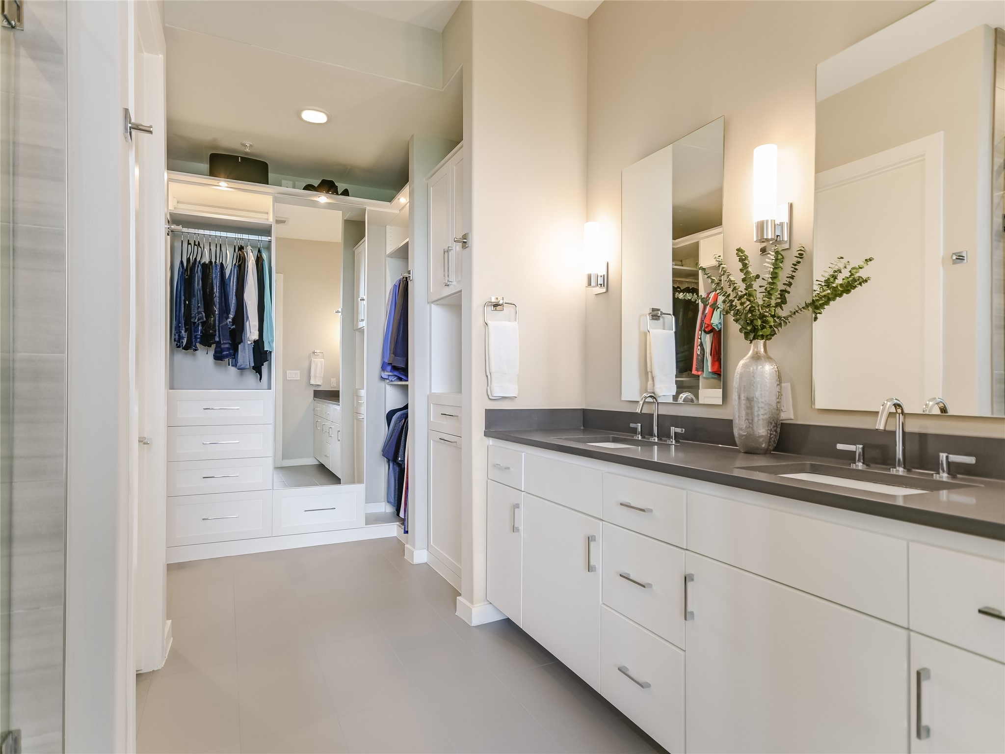 5921 Hiline Road, Unit 1501 Austin, TX 78734 - Photo 14 of 38 a bathroom with double vanity and a mirror