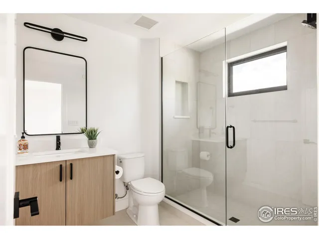 a view of a hallway with staircase