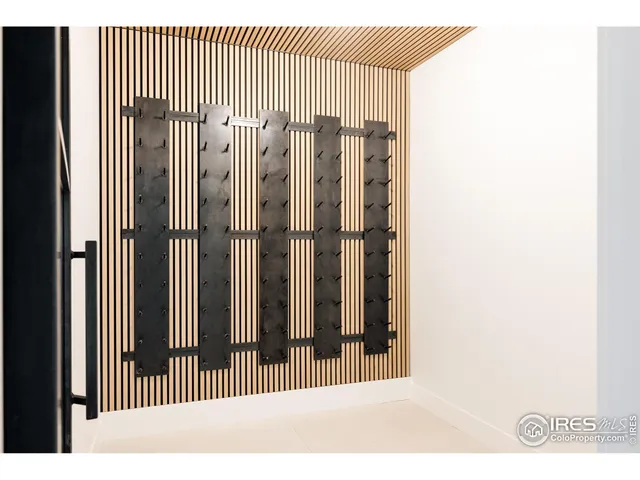 a balcony with table and chairs