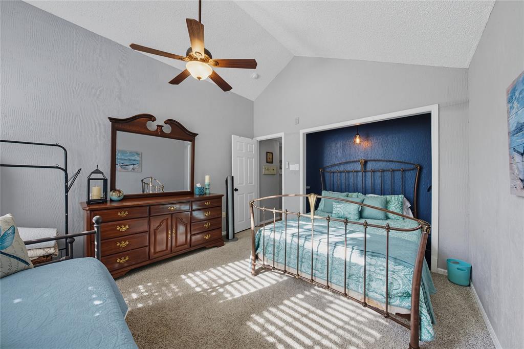 517 Shoreline Drive Tool, TX 75143 - Photo 13 of 28 a bedroom with a bed and a dresser