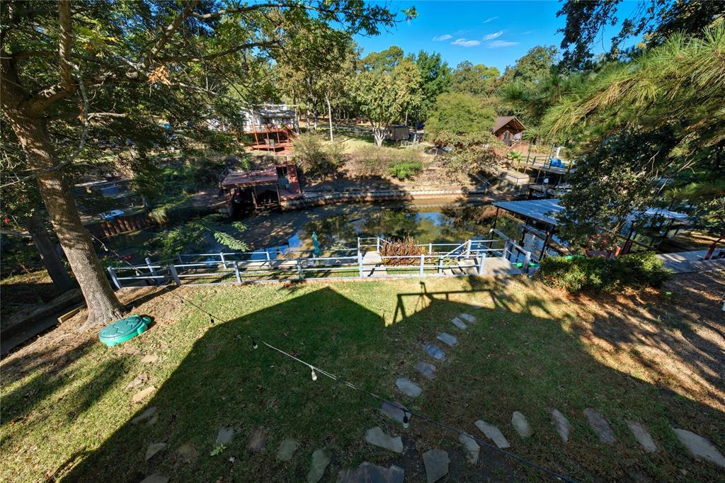 517 Shoreline Drive Tool, TX 75143 - Photo 18 of 28 a swimming pool with outdoor seating and yard