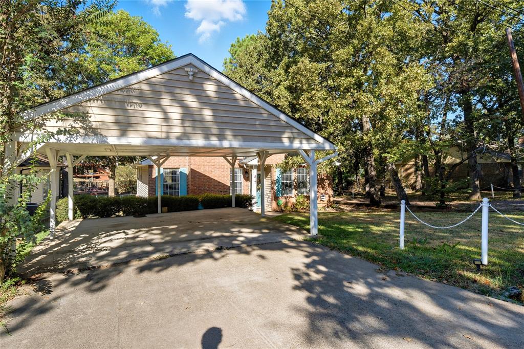 517 Shoreline Drive Tool, TX 75143 - Photo 19 of 28 a view of a house with a yard and tree s