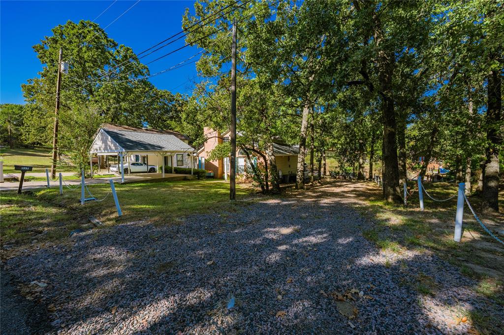 517 Shoreline Drive Tool, TX 75143 - Photo 28 of 28 a view of yard with tree s