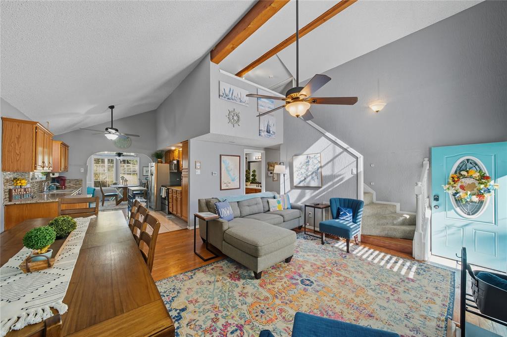 517 Shoreline Drive Tool, TX 75143 - Photo 3 of 28 a living room with furniture and a chandelier