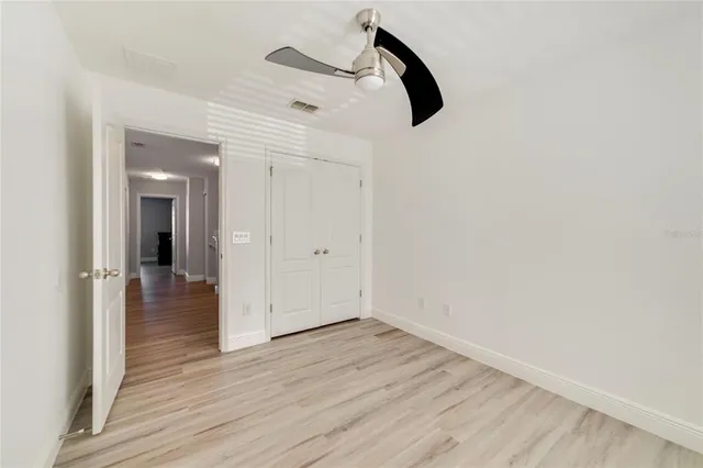 wooden floor in a hall with an entryway