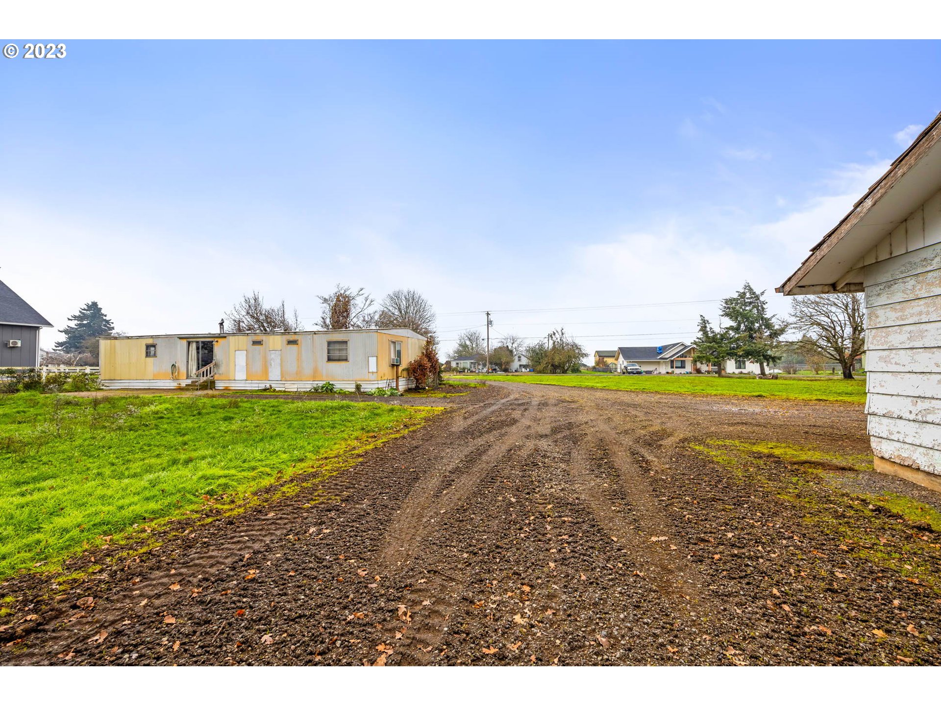 91467 Stallings Lane Eugene, OR 97408 - Photo 14 of 24 a view of a house with a yard