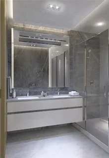 a bathroom with a tub and a sink