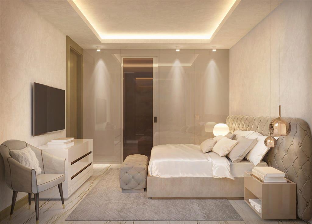 3319 North Ocean Drive, Unit 503 Hollywood, FL 33019 - Photo 6 of 29 a living room with furniture and a flat screen tv