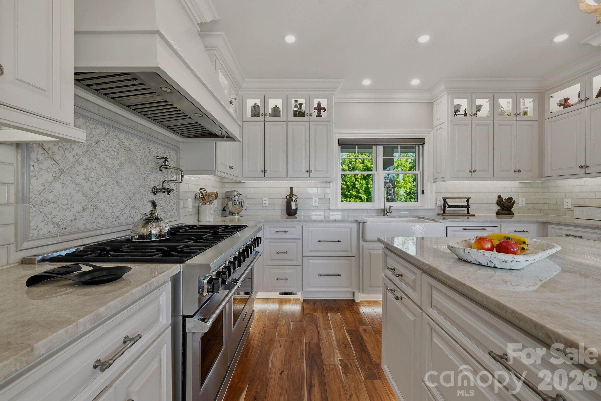 605 Recore Rdg Road Bessemer City, NC 28016 - Photo 11 of 47 a kitchen with stainless steel appliances a stove a sink and a refrigerator