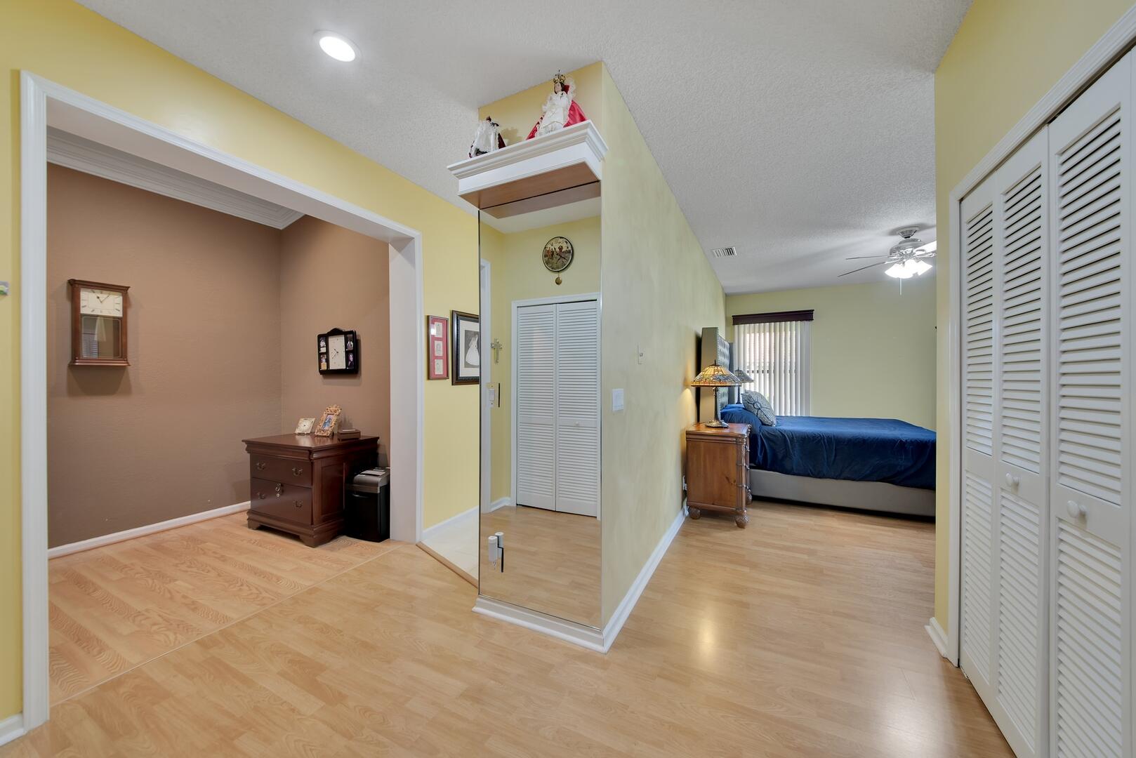 19261 Cherry Hills Terrace Boca Raton, FL 33498 - Photo 18 of 53 a bedroom with furniture and a bathroom