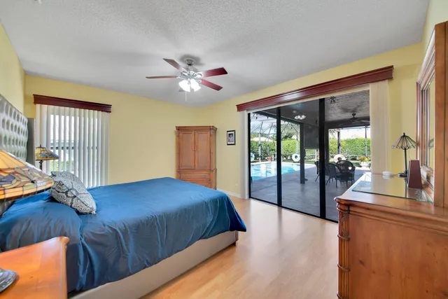 a bedroom with furniture and a bathroom