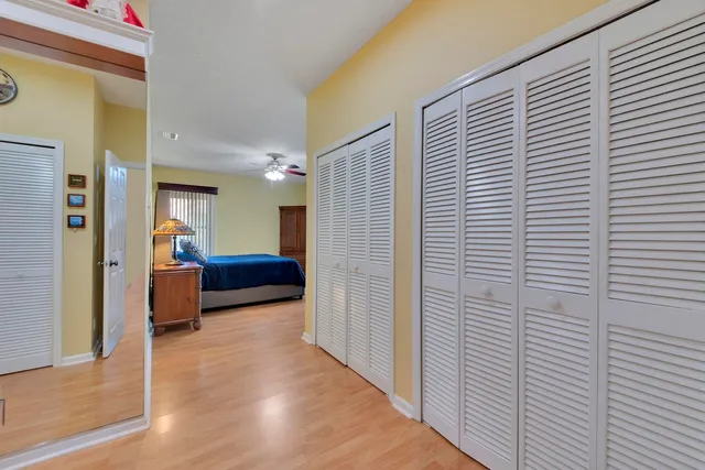 a bathroom with a tub shower and sink